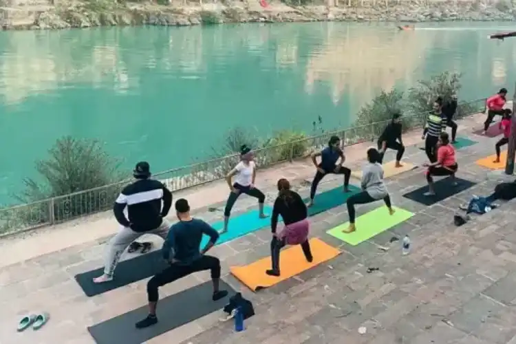 yoga-in-rishikesh-near-ganges.webp
